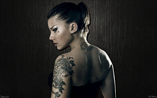 Woman tattoo looking down distance - tattoo free wallpaper