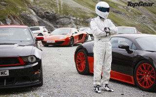 Man racing suit car mountains - racing free wallpaper