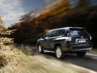 Black toyota truck driving road - bernt tunold free wallpaper