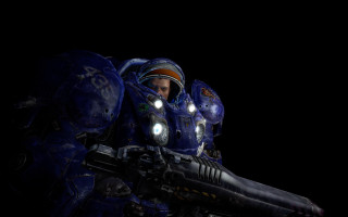 Space suit man gun helmet 2 - a man in a space suit holding free wallpaper