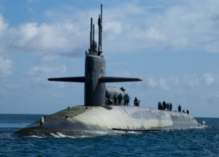 Submarine people boat ocean sky - a submarine free wallpaper