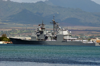 Battleship water mountain town foreground - a large battleship free wallpaper