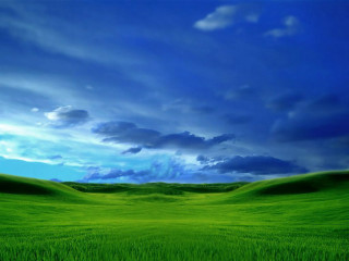 Green field blue sky clouds 5 - a green field in the foreground free wallpaper