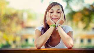 Girl smiling bench hands face - a bench free wallpaper