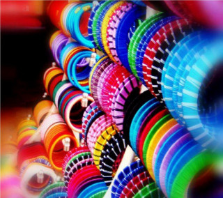 Colorful frisbees stacked row table - egyptian art free wallpaper for tablet