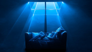 Woman couch blue light room - the ceiling free wallpaper