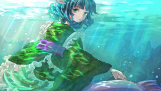 Woman green dress underwater fish - her hand and a fish free wallpaper