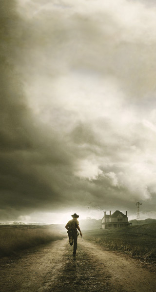 Man walking dirt road cloudy - under free wallpaper for mobile