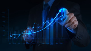 Man suit pointing graph screen - technique free wallpaper