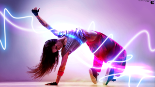 Woman dance neon lights purple - a purple background behind her free wallpaper