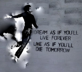 Man skateboarding graffiti wall quote - a skateboard free wallpaper for tablet