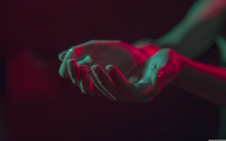 Person holding ball red light - elsa bleda free wallpaper