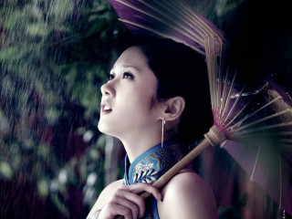 Woman holding umbrella rain forest - a rain free wallpaper