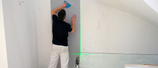 Man painting wall blue brush - interactive free wallpaper