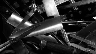 Pile knives black white photo - sharp foccus ilustration free wallpaper