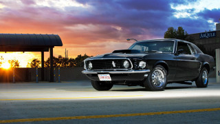 Black mustang sunset building clouds - the sun setting behind free wallpaper for desktop