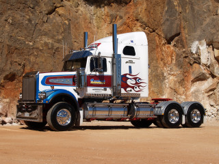 Semi truck rocky cliff red - anson maddock free wallpaper