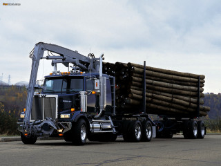 Large truck logs driving road - a large truck free wallpaper for desktop