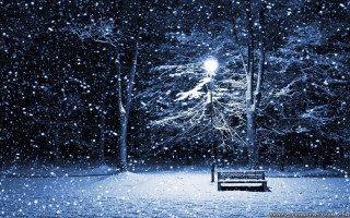 Bench snowy park night streetlight 5 - a street light in the background free wallpaper