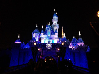 Castle lit night clock people - side and people free wallpaper