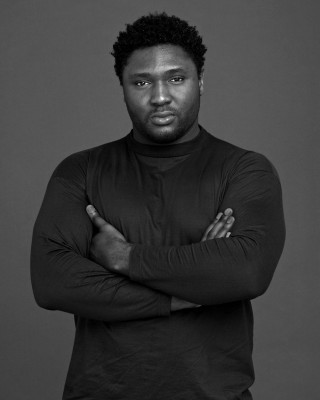 Man arms crossed posing black - studio portrait free wallpaper for mobile