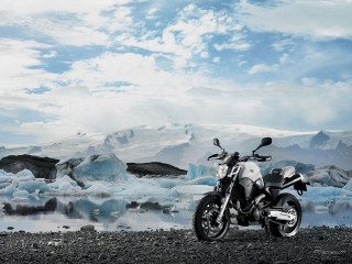 Motorcycle rocky beach glacier mountains - free winter wallpaper for desktop