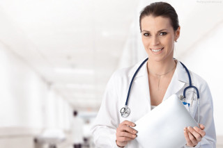 Woman doctor holding folder hospital - a stock photo free wallpaper