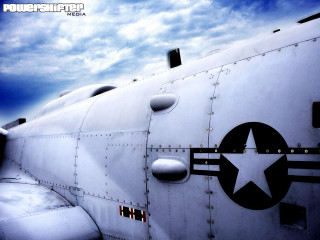 Military plane nose star cloudy 2 - a cloudy sky behind free wallpaper