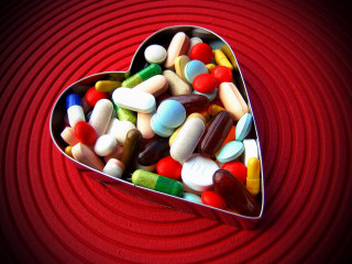 Heart tin pills red black - a red surface free wallpaper