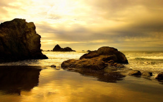 Rock formation beach sunset water 2 - cinematic landscape free wallpaper