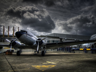 Plane parked tarmac cloudy sky - brassaï free wallpaper