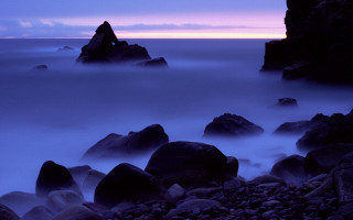 Rocky beach purple sky clouds 2 - bascove free wallpaper
