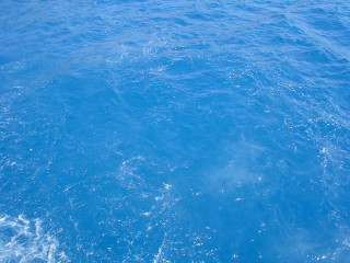 Blue ocean boat distance water 2 - a blue ocean free wallpaper