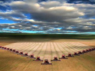 Crops field red tractors cloudy 2 - the middle of it free wallpaper