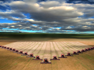 Crops field red tractors cloudy 4 - a tilt shift photo free wallpaper