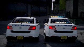 Two white police cars nighttime - a street free wallpaper for desktop