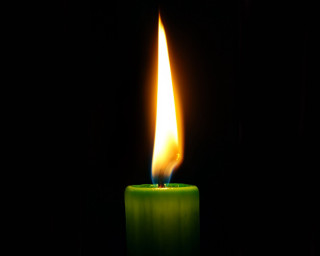 Candle bright flame black background 3 - a candle free wallpaper