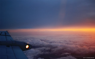 Plane wing sunset clouds light 3 - atmospheric free wallpaper