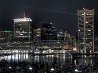City skyline night boats docked - the building and water free wallpaper