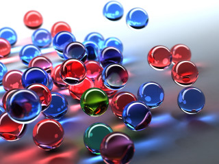 Colorful balls floating white table - top of a table next free wallpaper