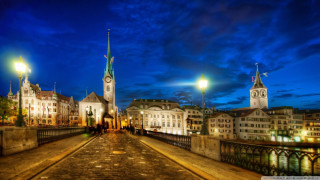 City street clock tower night 7 - a clock tower in the background free wallpaper for desktop