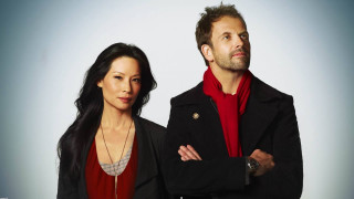 Man woman serious arms crossed - andrew bell free wallpaper