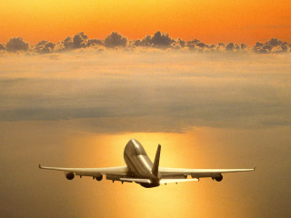 Plane flying sky sun clouds 4 - a plane free wallpaper