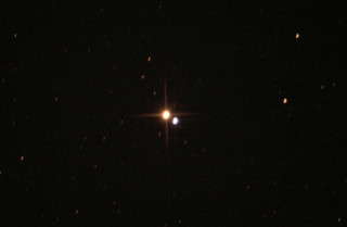 Bright light shines dark sky - free stars wallpaper