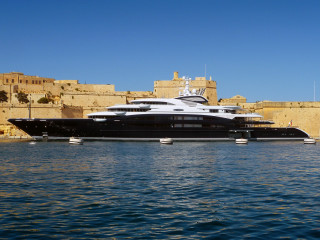 Large boat docked city wall - the other side free wallpaper for desktop