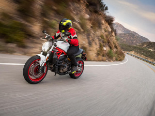 Man motorcycle curvy road mountain - a helmet free wallpaper