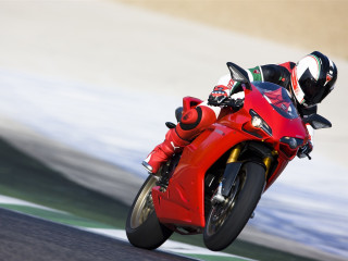 Person riding red motorcycle track - the back of the motorcycle free wallpaper