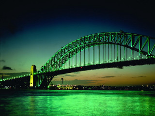 Large bridge night water green - a large bridge over a body of water free wallpaper