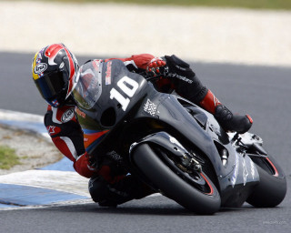 Motorcycle curve leaning helmet track 2 - eric dinyer free wallpaper