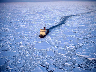 Boat floating ice ocean water 2 - a boat free wallpaper